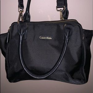 Calvin Klein midsize purse with shoulder straps in excellent like new condition.